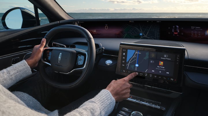 The driver of a 2024 Lincoln Nautilus® SUV interacts with the new Lincoln Digital Experience. | Empire Lincoln in Abingdon VA